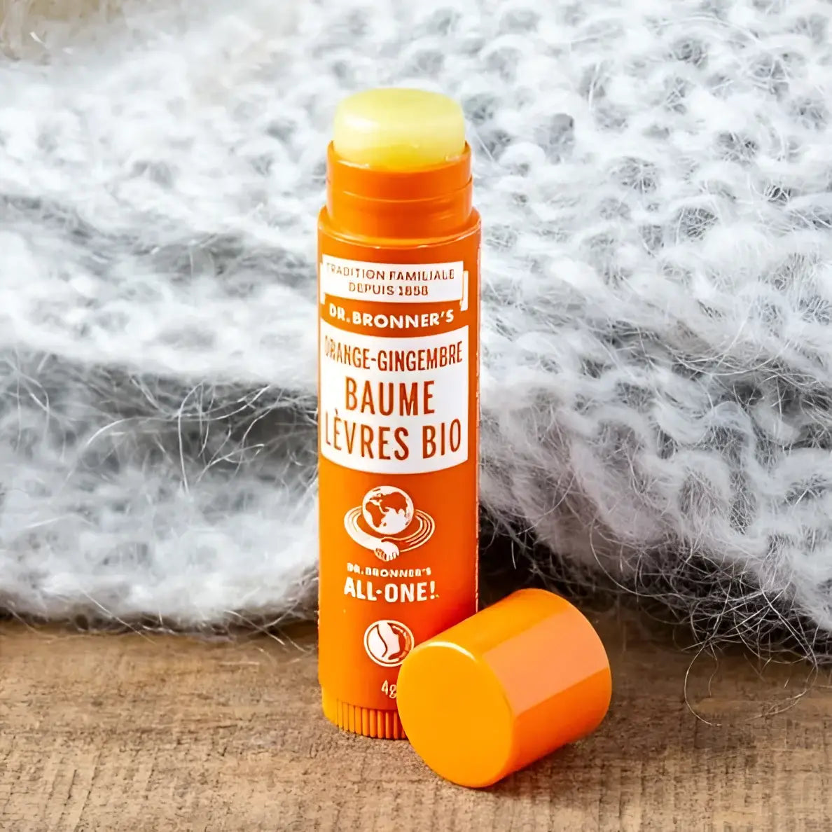 Baume à lèvres orange gingembre ouvert, tube orange