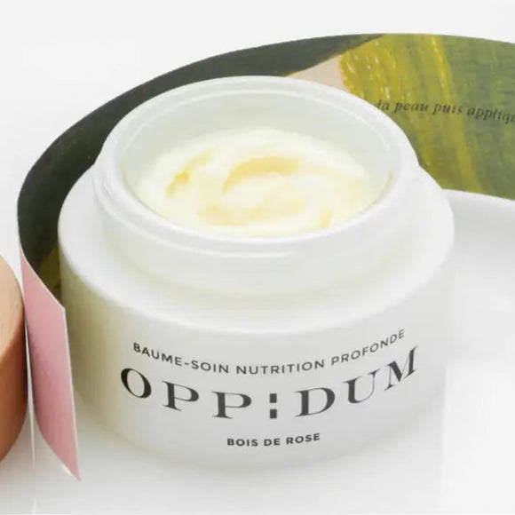 Open jar of Baume Soin Nutrition profonde bois de rose facial cream