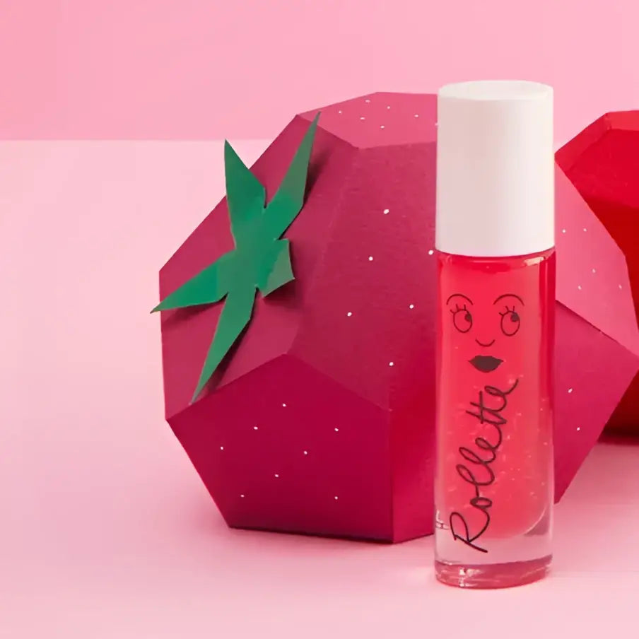 Brillant à lèvres enfant format bille framboise rose avec yeux et lèvres