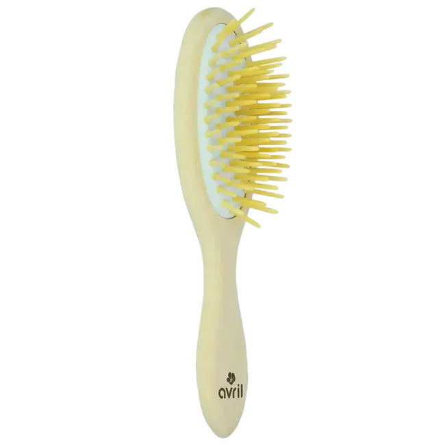 Brosse à cheveux en bois de hêtre jaune clair pour routine capillaire naturelle