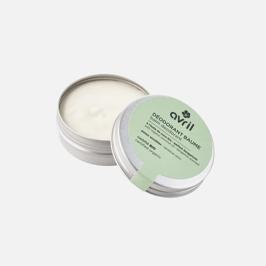 Boîte ouverte de déodorant baume bio pour peaux sensibles, texture fondante