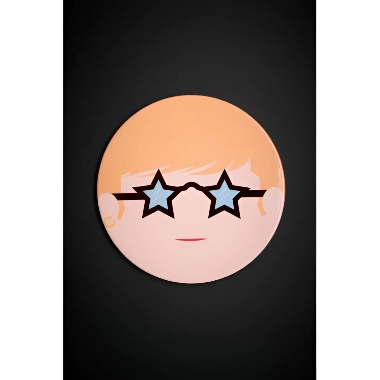 Pin visage cartoon orange rose circulaire céramique Elton clin d’œil couleurs éclatantes