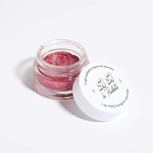 Gel pailleté tagadamour avec un pot ouvert de glitter rose scintillant