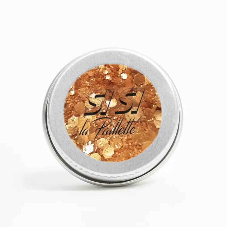 Une boîte ronde de paillettes biodégradables bronze pour un maquillage éclatant Paillettes Queen