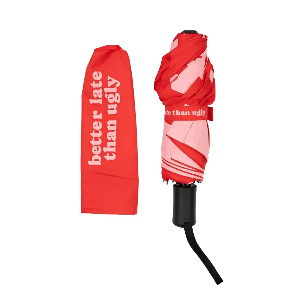Parapluie pliant rouge et rose motif, manche noir, housse rouge assortie Better Late Than Ugly