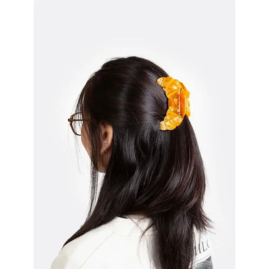 Pince à cheveux originale en plastique ambré translucide texturé
