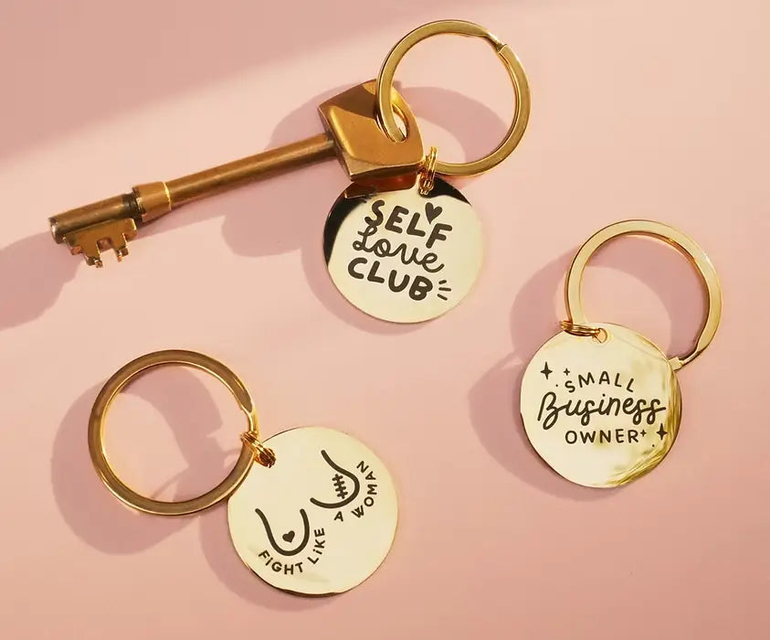 Porte-Clé Survivor : porte-clé inoxydable doré avec force intérieure