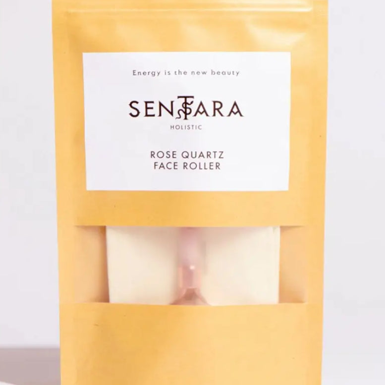 Quartz rose roller quartz rose dans emballage jaune avec fenêtre pour soin du visage
