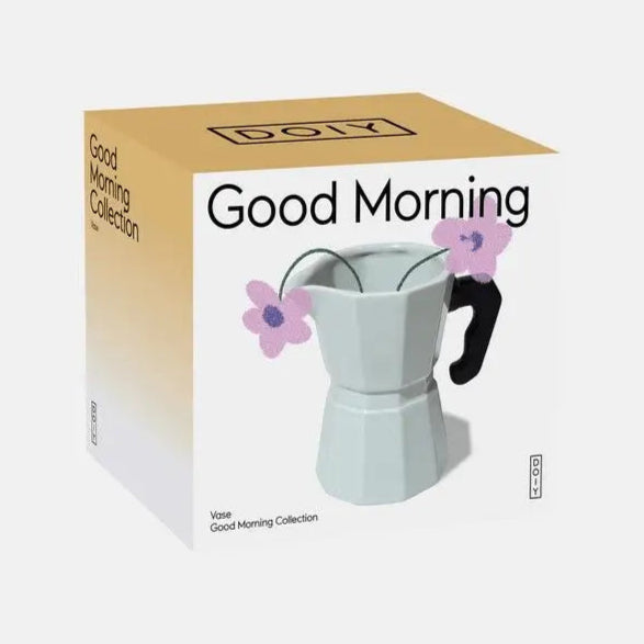 Vase cafetière doiy en objet déco avec fleurs violettes et design unique