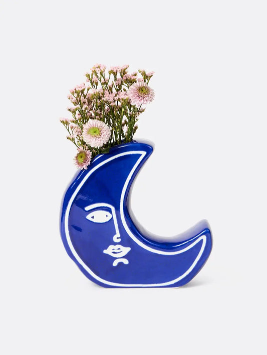 Vase Moon Évoque : silhouette Évocatrice en bleu cobalt avec fleurs roses
