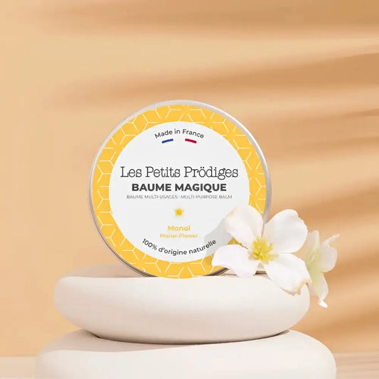 Photo du Baume Multi Usage Monoi des Petits Prodiges avec motif miel et fleur blanche