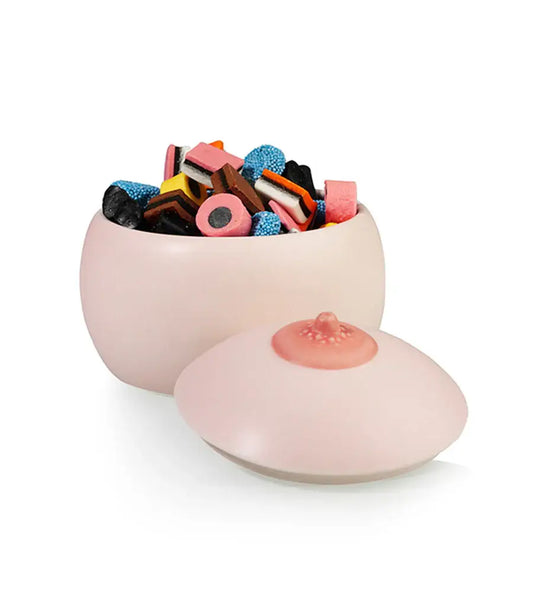 Boîte Sein Originale : plat en forme de sein rose pâle rempli de bonbons licorice colorés