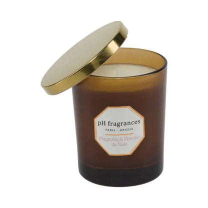 Bougie magnolia en pot verre brun, couvercle doré détaché