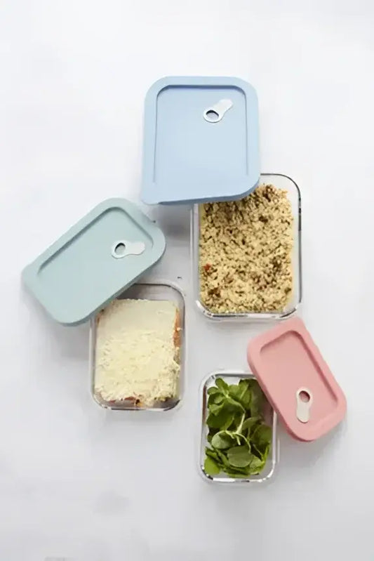 Bouteille hermétique en verre trempé 1L rectangulaire avec couvercle silicone bleu clair et système d’étanchéité