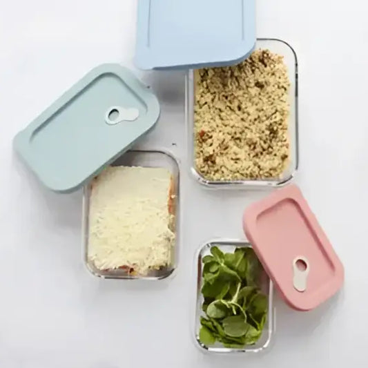 Bouteille rectangulaire en verre avec couvercle en silicone bleu clair et évent vapeur
