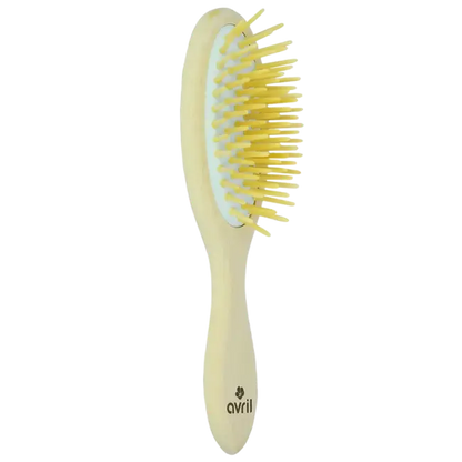 Brosse à cheveux en bois de hêtre jaune clair pour routine capillaire naturelle