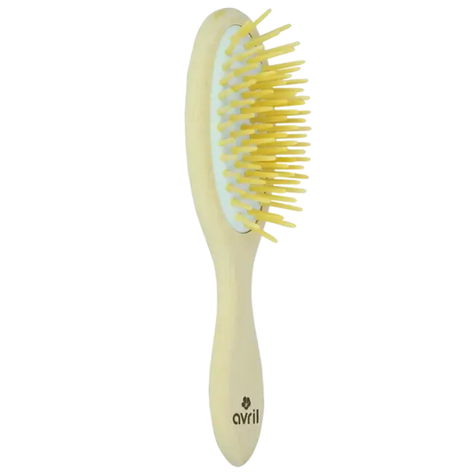 Brosse à cheveux en bois de hêtre jaune clair pour routine capillaire naturelle
