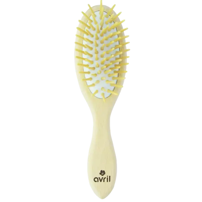 Brosse à cheveux en bois de hêtre jaune pâle pour routine capillaire naturelle