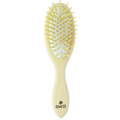 Brosse à cheveux en bois de hêtre jaune pâle pour routine capillaire naturelle