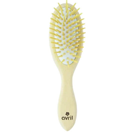 Brosse à cheveux en bois de hêtre jaune pâle pour routine capillaire naturelle