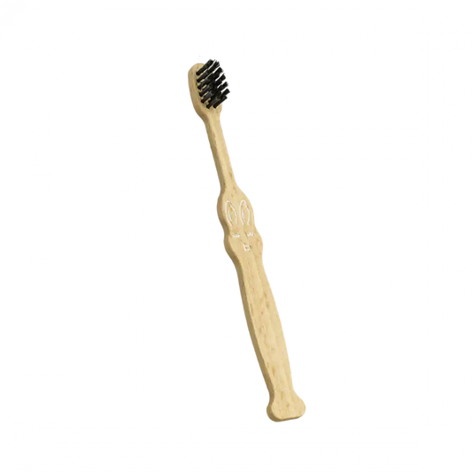 Brosse à dents enfant Le Petit Dubois blanc avec poils noirs, pour bons gestes dentaires