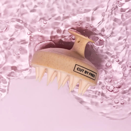 Brosse stimulante pour le cuir chevelu avec bristles douces pour ta routine capillaire