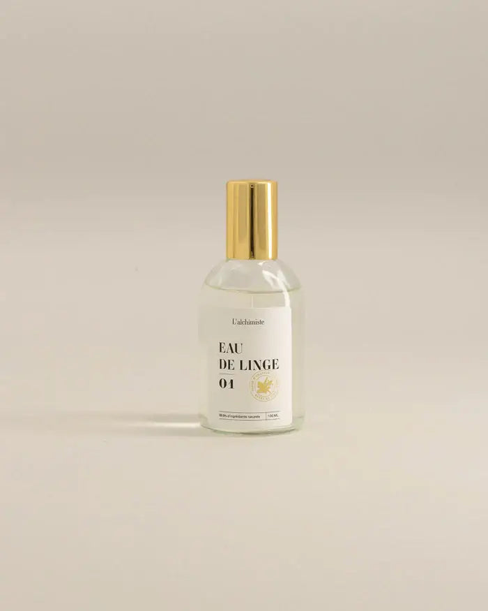 Bouteille en verre clair avec bouchon doré de Brume de linge 100 ml, fraîcheur naturelle