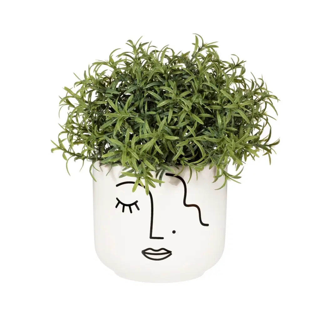 Cache pot visage abstrait en céramique blanche avec feuillage faux vert, style design minimaliste
