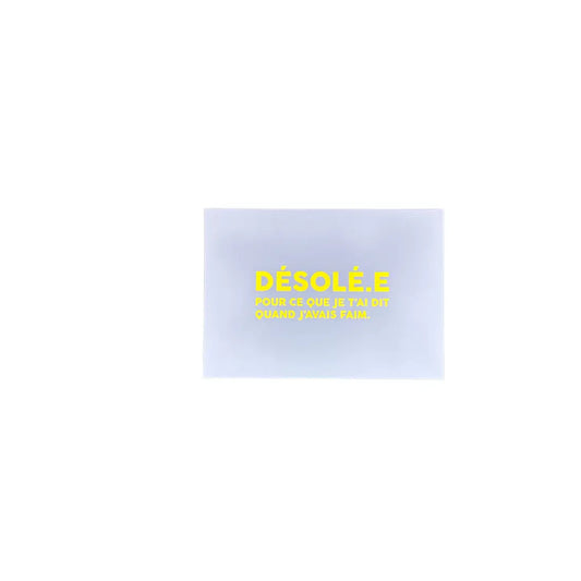 Carte bleue format pratique avec texte jaune désolé pour ce que jai dit quand jétais saoul, design épuré et typographie efficace