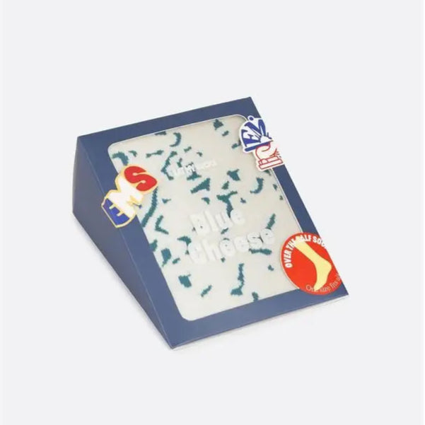 Boxe de chaussettes blanc avec motif vert, clin d’œil subtil au fromage bleu