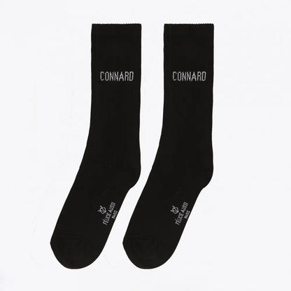 Chaussettes connard blanche noires avec CONNARD écrit sur la cheville, parfait pour ton style