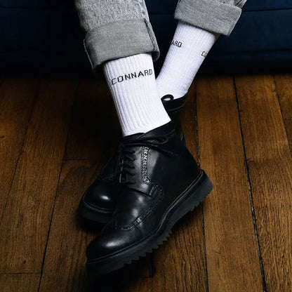 Bottes cuir noir montantes avec chaussettes connard blanches 40-45