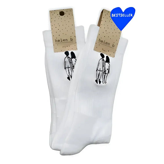 Chaussettes naked couple avec touche d’humour, dessin de deux figures qui se tiennent la main