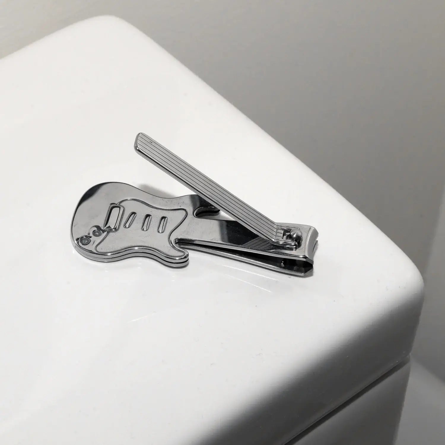Coupe-ongles guitare rock avec finition soignée