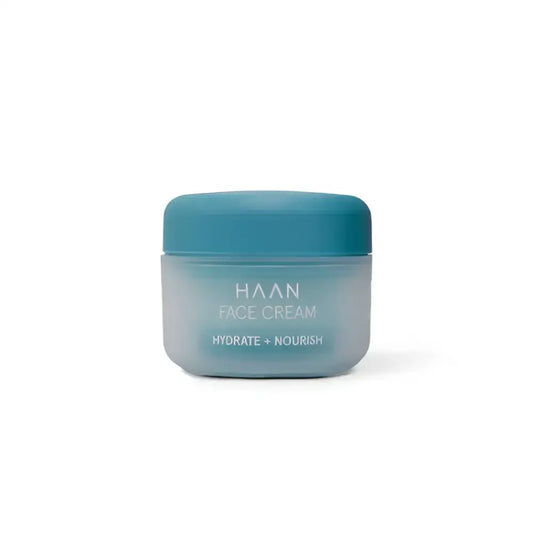 Crème hydratante visage peau normale à mixte dans un conteneur bleu et givré