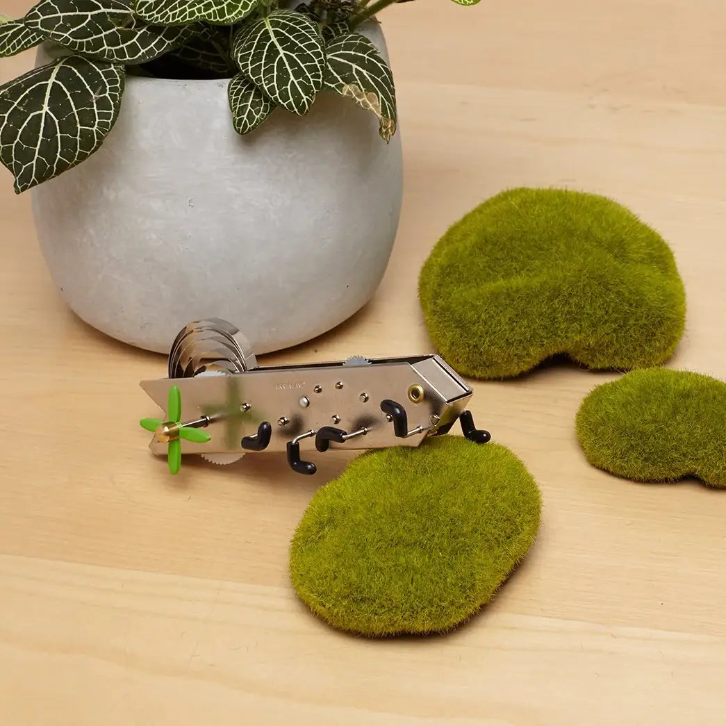 Jouet Critters Bonga créature mécanique en argent avec ailes vertes