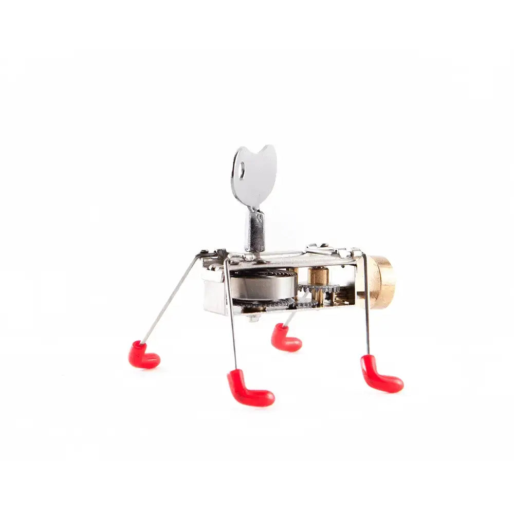 Créature mécanique araignée argent et laiton au charme rétro