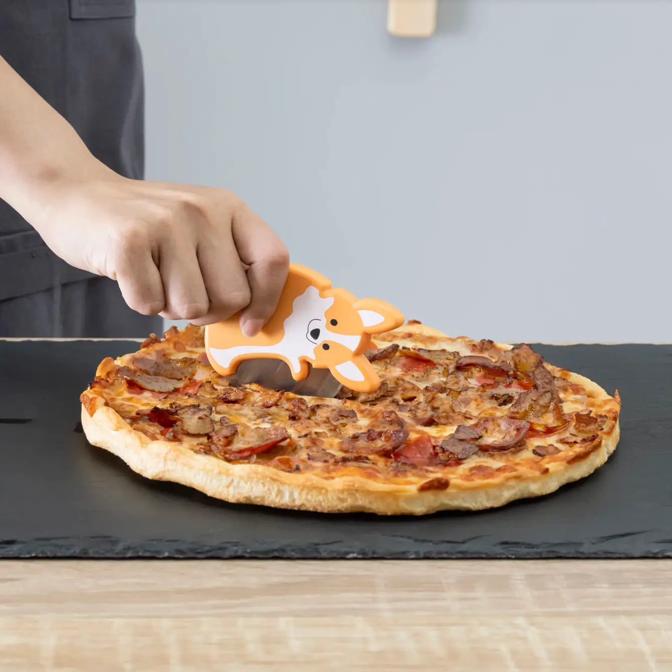 Découpe pizza chien corgi orange et blanc pour moments gourmands