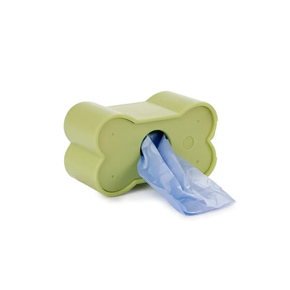 Distributeur de sacs à crottes biscuit vert avec sac bleu sortant