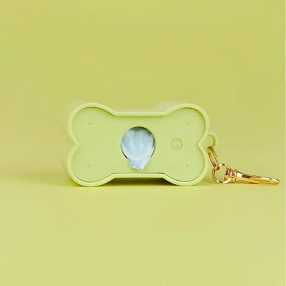 Distributeur de sacs à crottes biscuit vert avec clin d’œil
