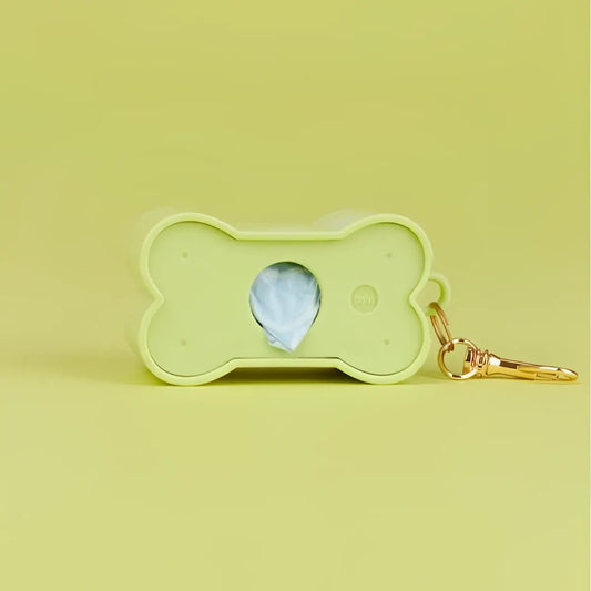 Distributeur de sacs à crottes biscuit vert avec clin d’œil