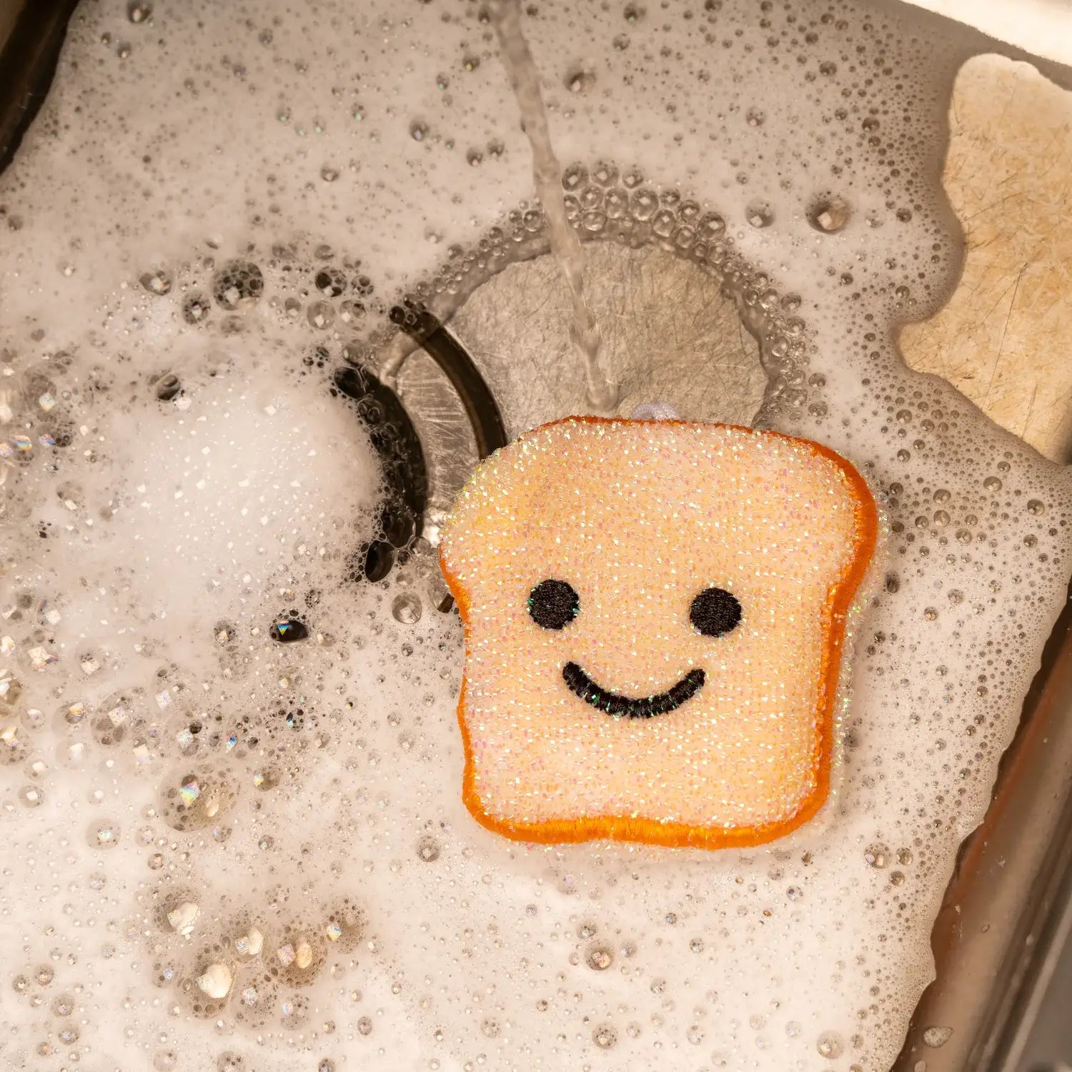 Éponge toasts en forme de pain grillé souriant pour cuisine propre