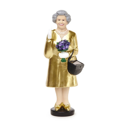 Figurine solaire queen dorée brillante dElisabeth en robe formelle avec roses violettes et sac matelassé noir