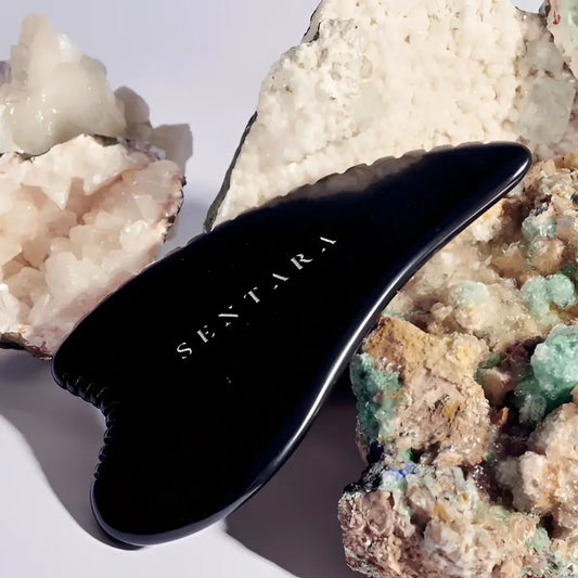 Outil gua sha noir en pierre naturelle pour peau d’ange corps
