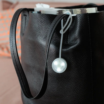 Lampe sac rechargeable sphérique translucide avec boucle flexible
