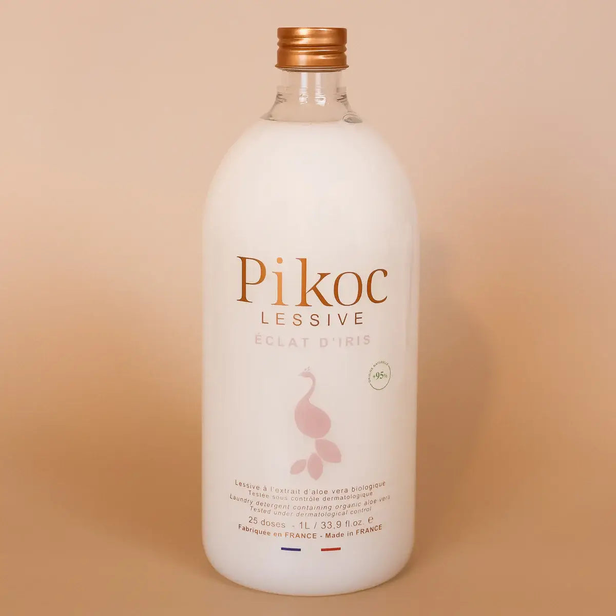 Bouteille blanche Pikoc Lessive Eclat d’iris 1L avec capuchon cuivré, formule innovante naturelle
