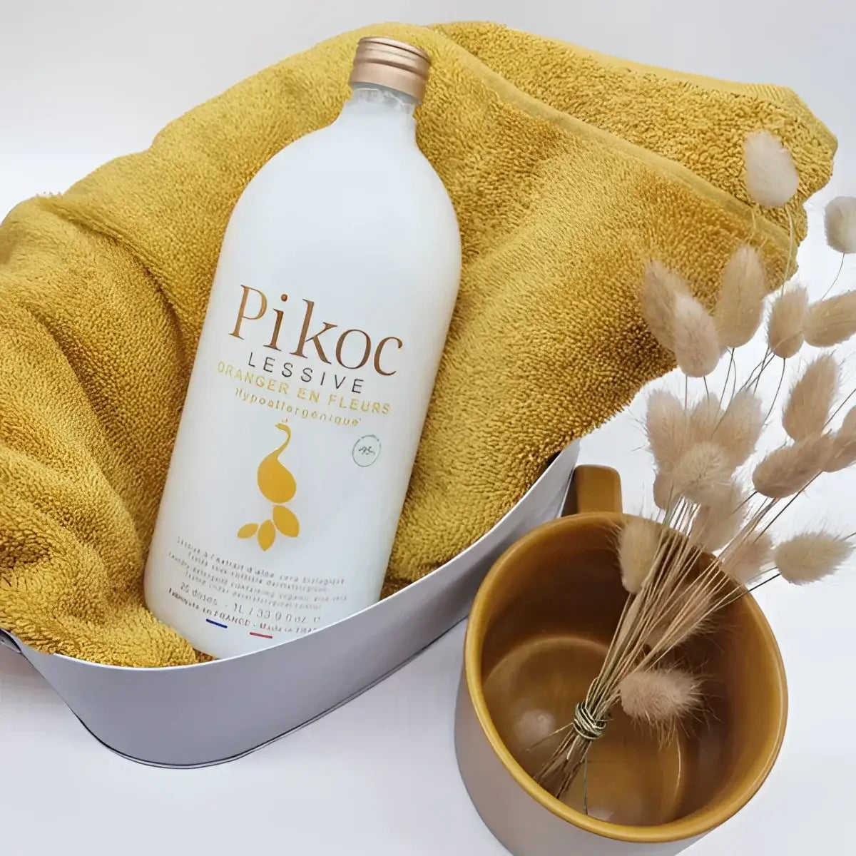Bouteille blanche de lessive oranger en fleurs 1L, formule respectueuse