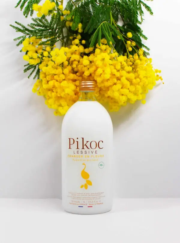 Bouteille blanche Pikoc lessive oranger en fleurs 1L, formule respectueuse