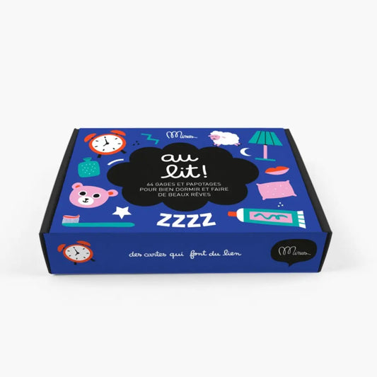 Boîte bleue rectangulaire Au Lit ! avec illustrations ludiques, nuée noire et beaux rêves pour ambiance chaleureuse