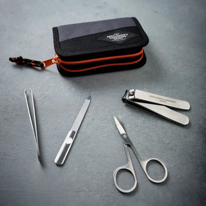 Trousse manucure Gentlemen’s Hardware raffinée en argent, étui noir orange
